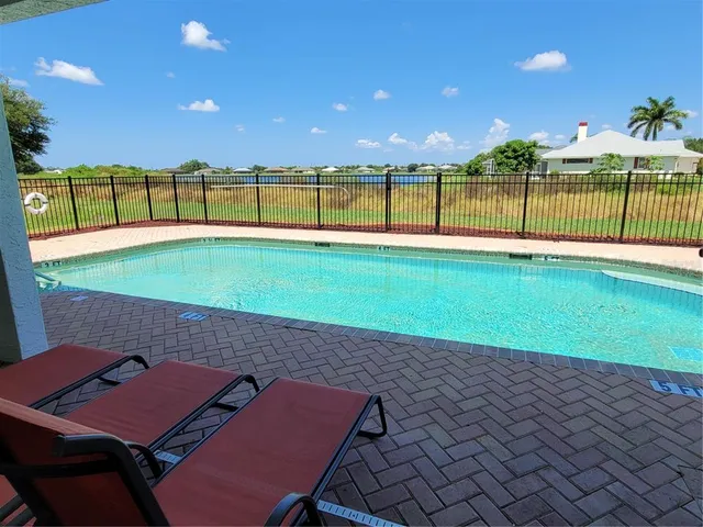 a view of a yard with furniture
