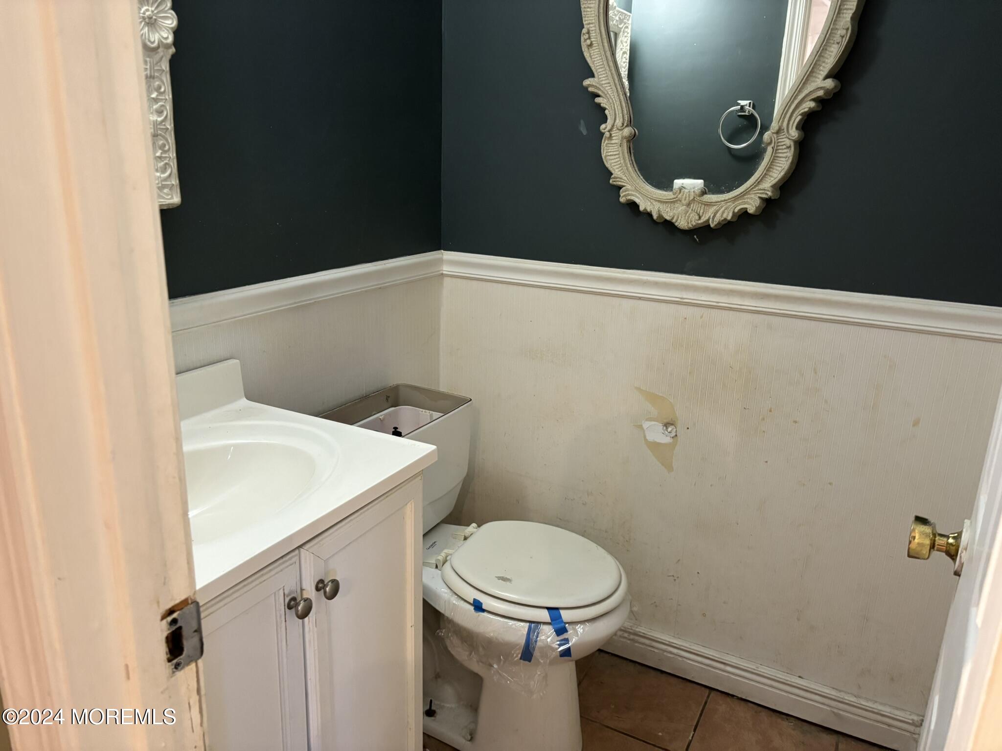 120 Primrose Lane Brick, NJ 08724 - Photo 17 of 21 a bathroom with a sink a toilet and mirror