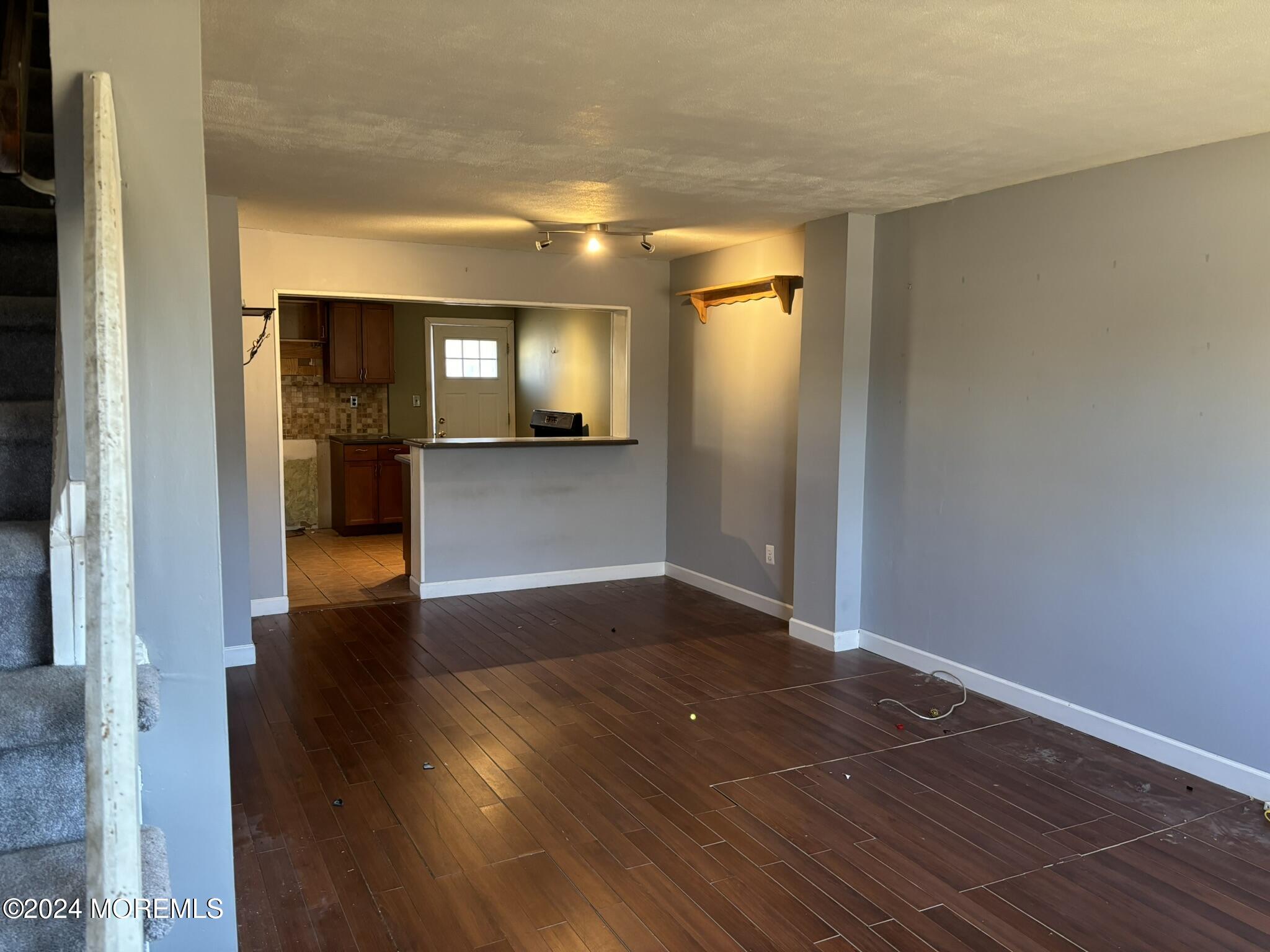 120 Primrose Lane Brick, NJ 08724 - Photo 9 of 21 a view of a hallway with wooden floor