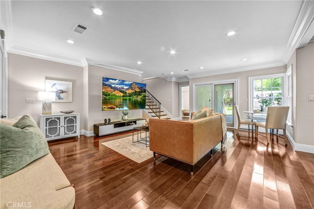 1665 Lorain Road San Marino, CA 91108 - Photo 11 of 45 a living room with furniture wooden floor and a flat screen tv