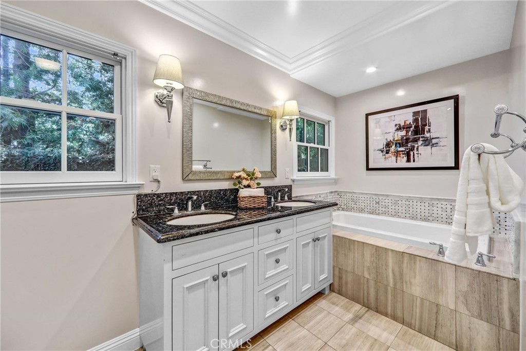 1665 Lorain Road San Marino, CA 91108 - Photo 26 of 45 a bathroom with a sink and a bathtub