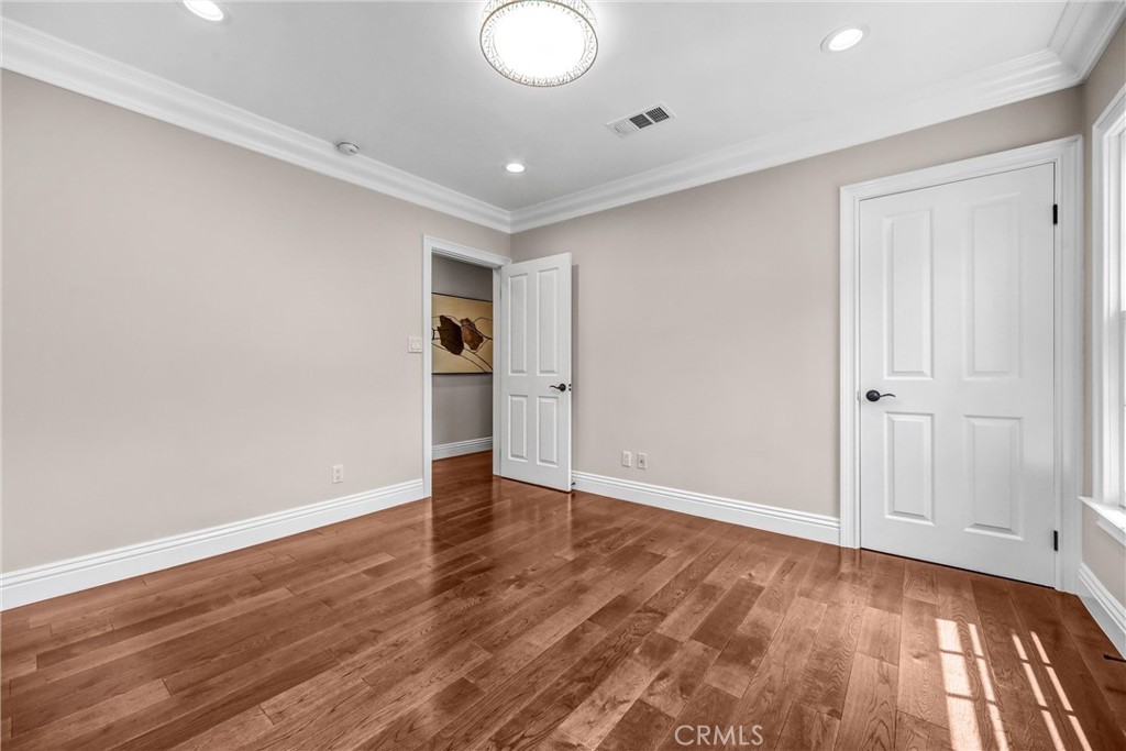 1665 Lorain Road San Marino, CA 91108 - Photo 30 of 45 a view of an empty room with wooden floor