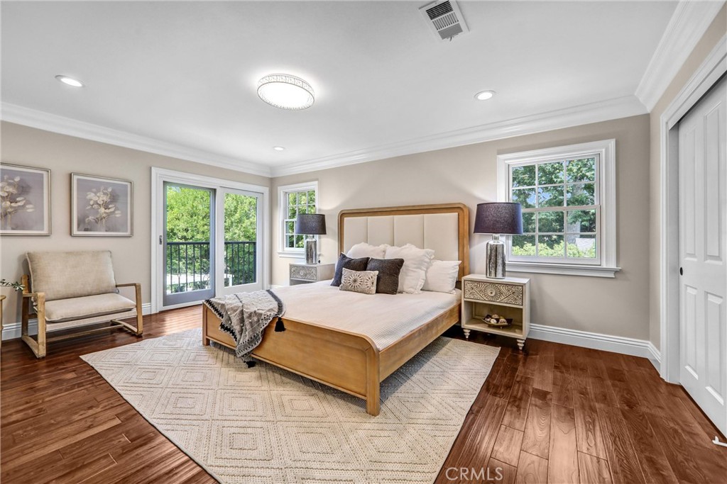 1665 Lorain Road San Marino, CA 91108 - Photo 32 of 45 a bedroom with a bed and wooden floor