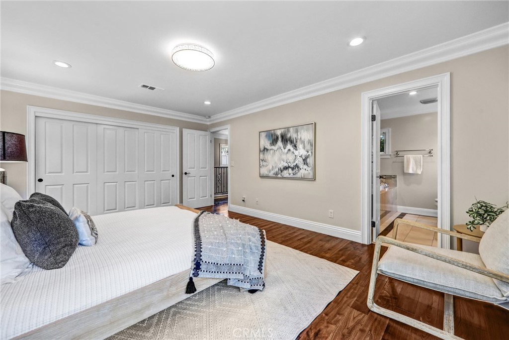 1665 Lorain Road San Marino, CA 91108 - Photo 34 of 45 a bedroom with furniture and a wooden floor