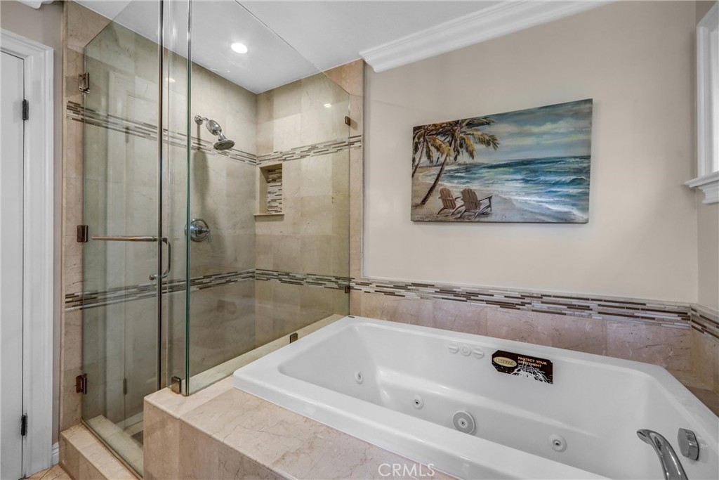1665 Lorain Road San Marino, CA 91108 - Photo 36 of 45 a bathroom with a tub and a shower