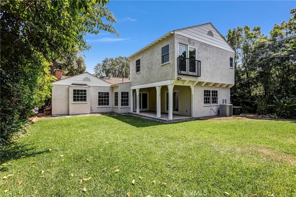 1665 Lorain Road San Marino, CA 91108 - Photo 38 of 45 a front view of a house with a garden