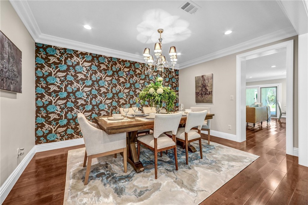 1665 Lorain Road San Marino, CA 91108 - Photo 9 of 45 a view of a dining room with furniture and wooden floor
