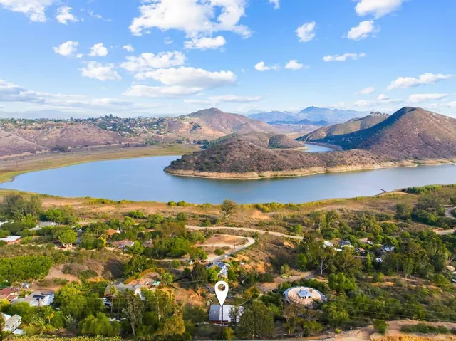 a view of a city with mountains in the background
