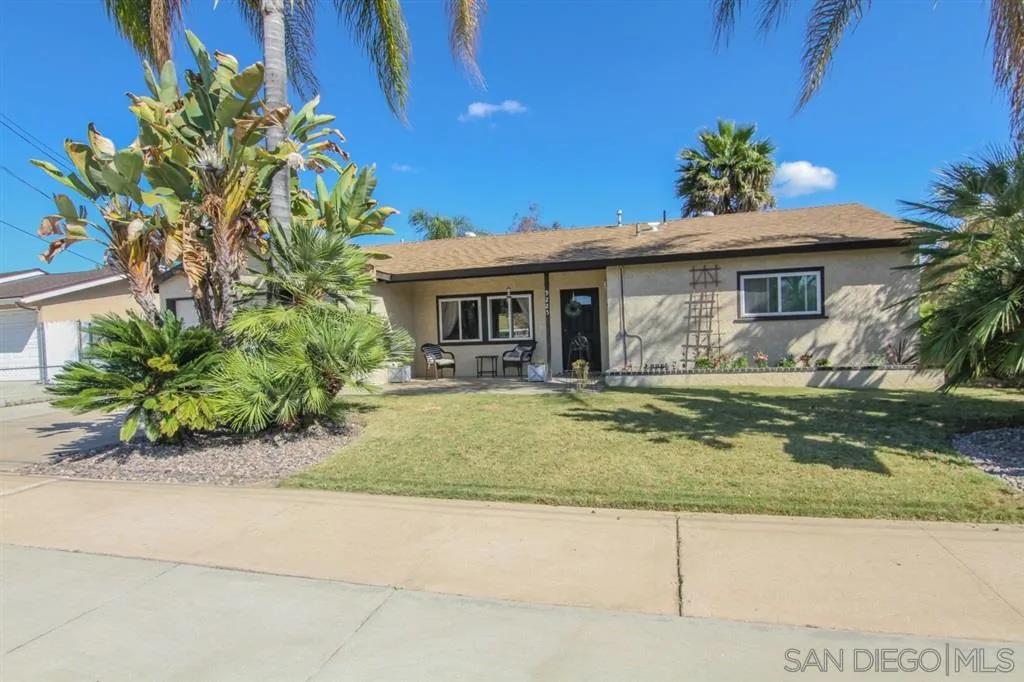 9225 Carita Road Santee, CA 92071 - Photo 1 of 24 a front view of a house with garden