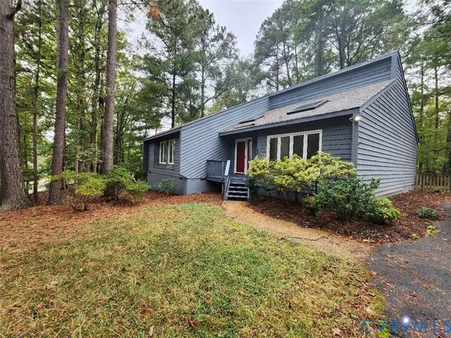 a house view with a garden space
