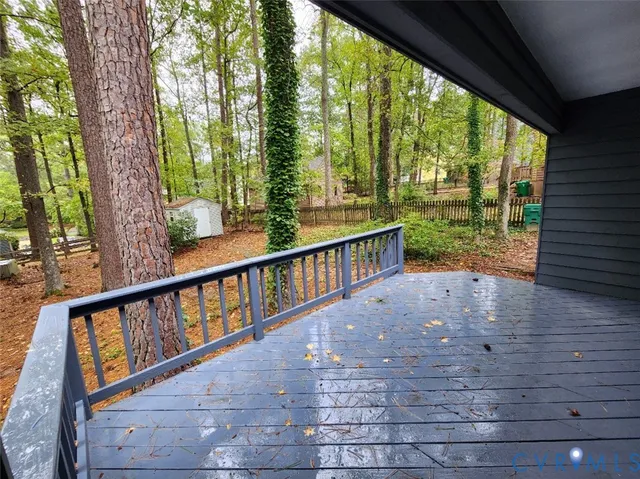 a view of balcony with yard
