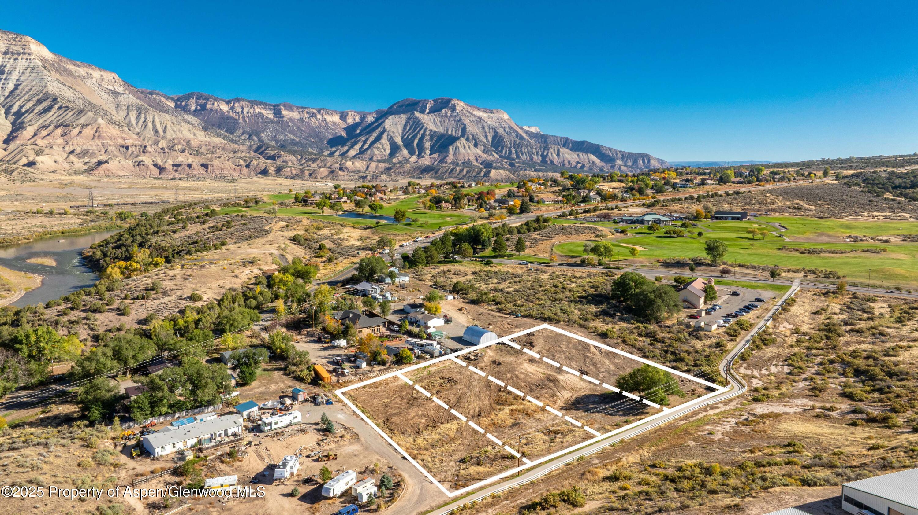 a view of a mountain with a outdoor space