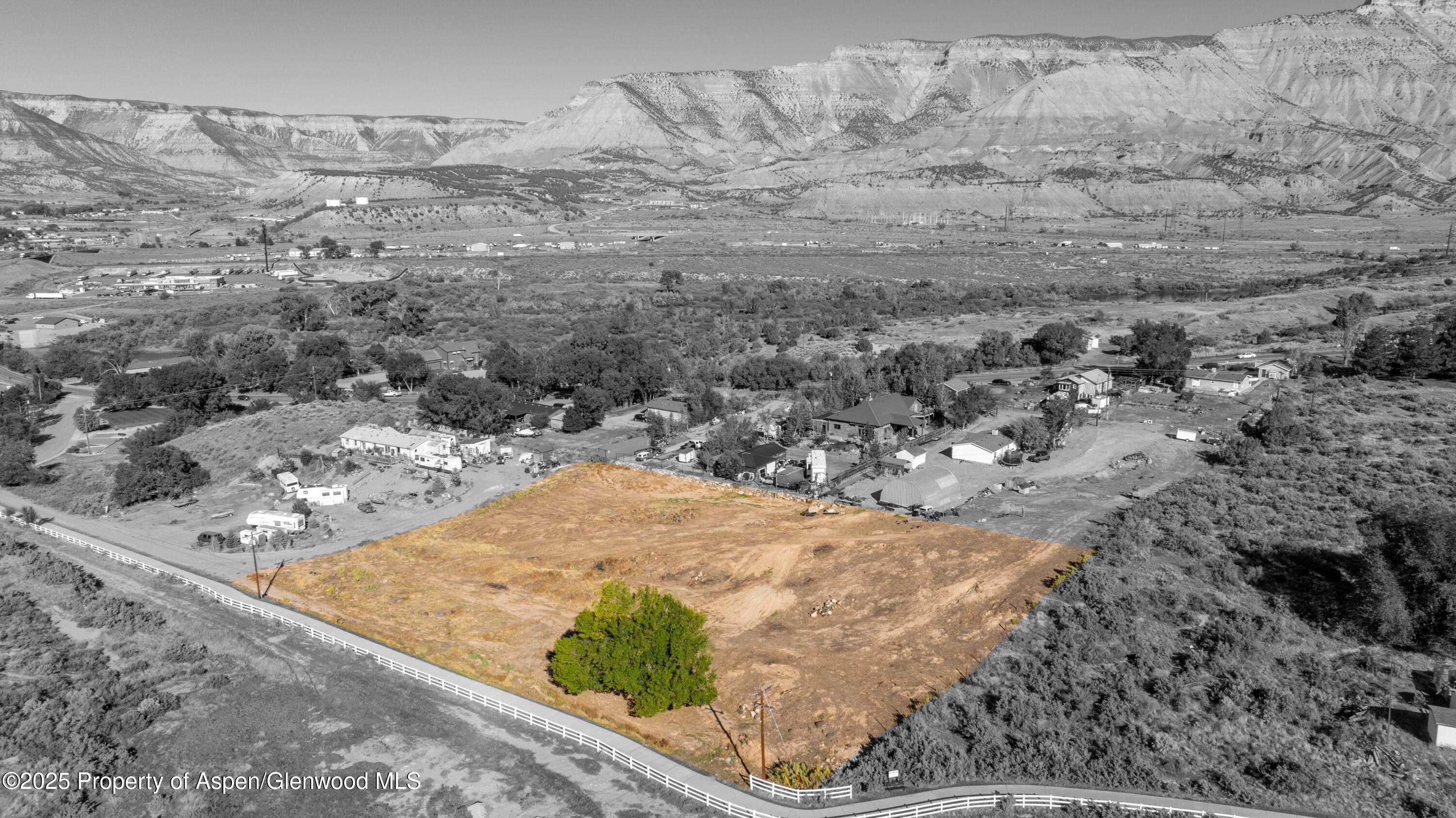 305 Parachute Co 81635 Parachute, CO 81635 - Photo 2 of 10 a view of a backyard of the house