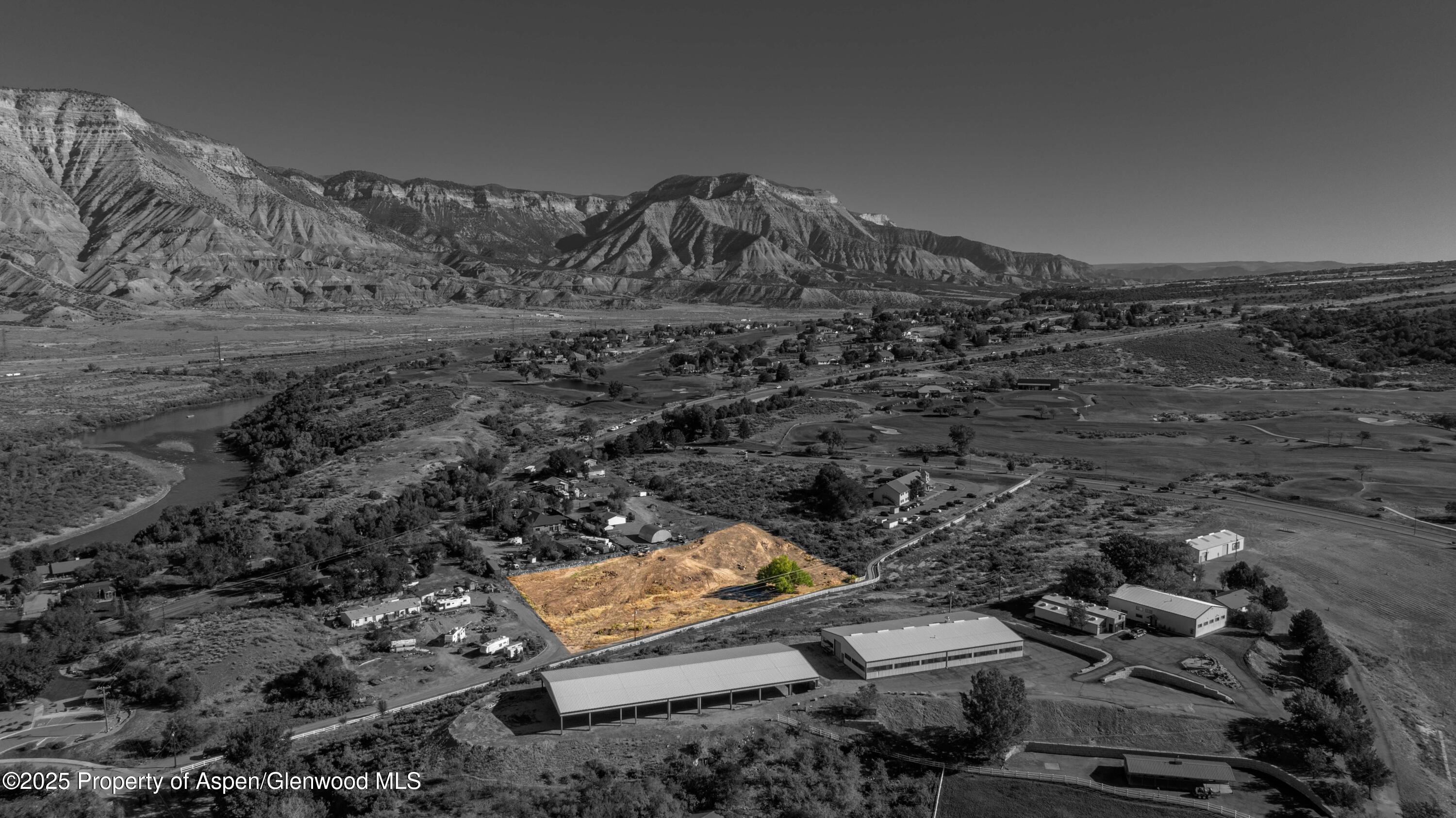 305 Parachute Co 81635 Parachute, CO 81635 - Photo 10 of 10 a view of a parking space with wooden fence
