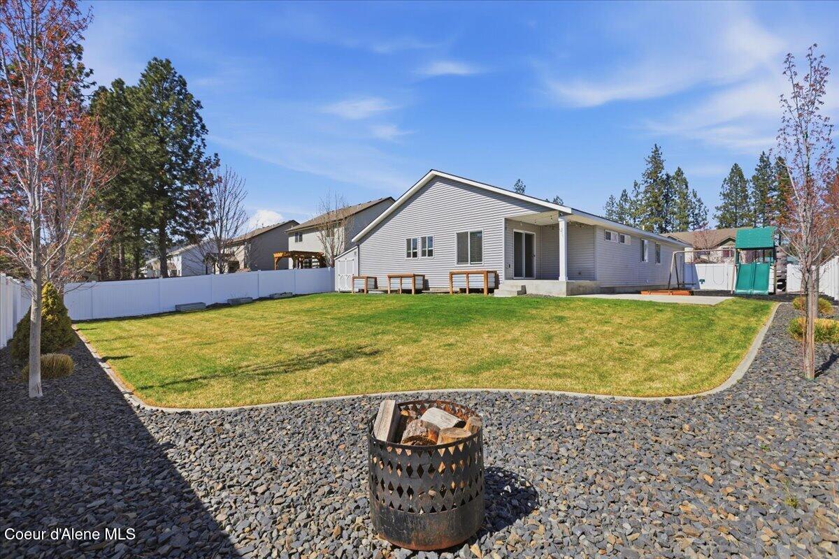 6924 Christine Street Rathdrum, ID 83858 - Photo 4 of 79 Fire Pit back yard