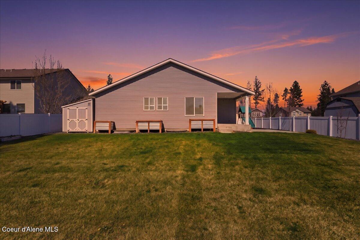 6924 Christine Street Rathdrum, ID 83858 - Photo 62 of 79 Twilight Back of Home