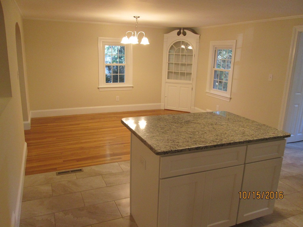 40 Highland Terrace Taunton, MA 02780 - Photo 3 of 29 a bathroom with a granite countertop sink and window