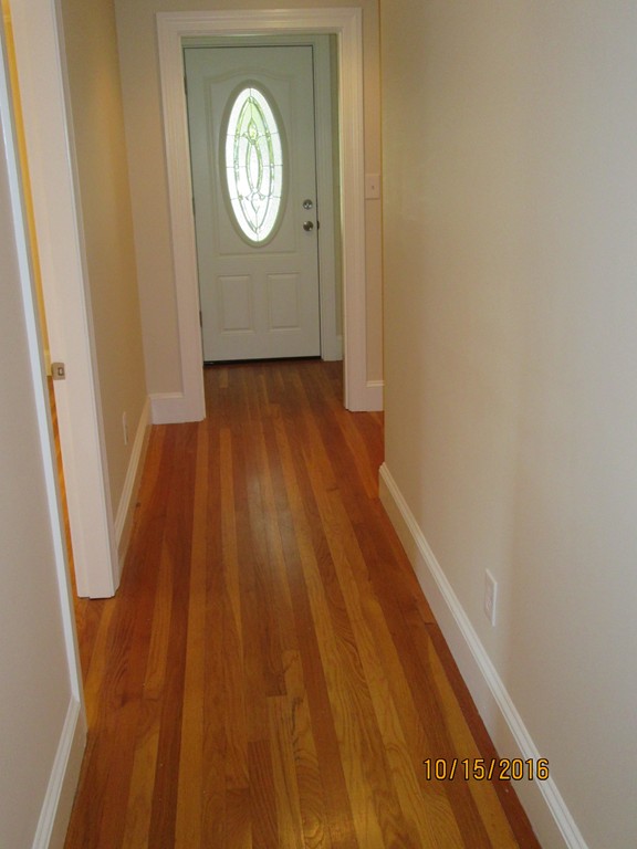 40 Highland Terrace Taunton, MA 02780 - Photo 7 of 29 a view of a hallway with wooden floor