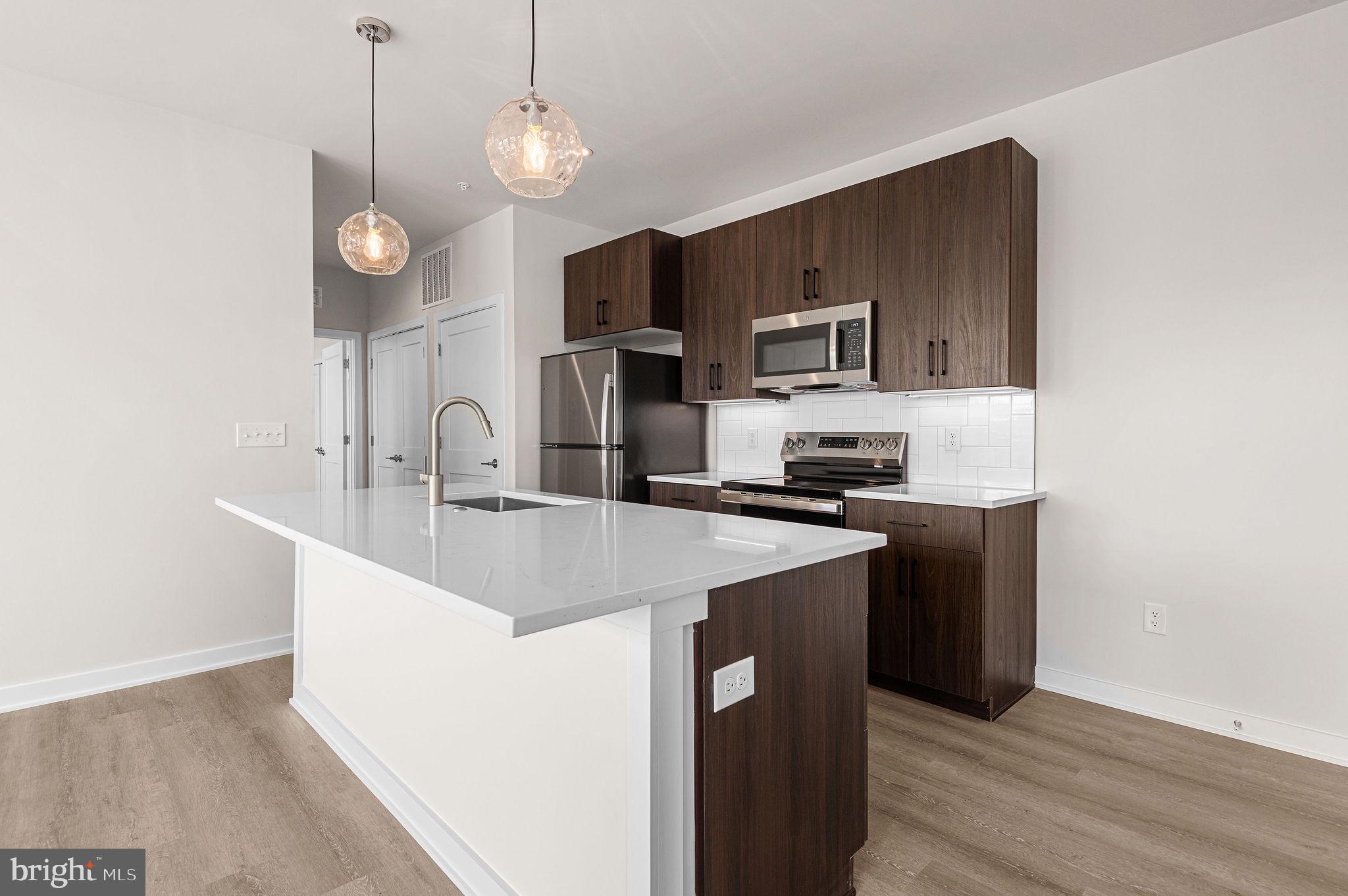26 South York Road, Unit 409 Hatboro, PA 19040 - Photo 2 of 16 Modern kitchen with sleek finishes.