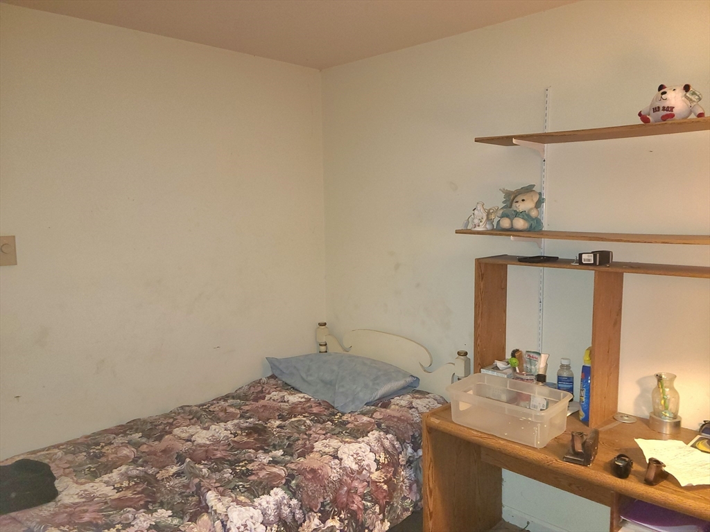 17 Harvard Street Natick, MA 01760 - Photo 12 of 12 a bathroom with a sink and a mirror