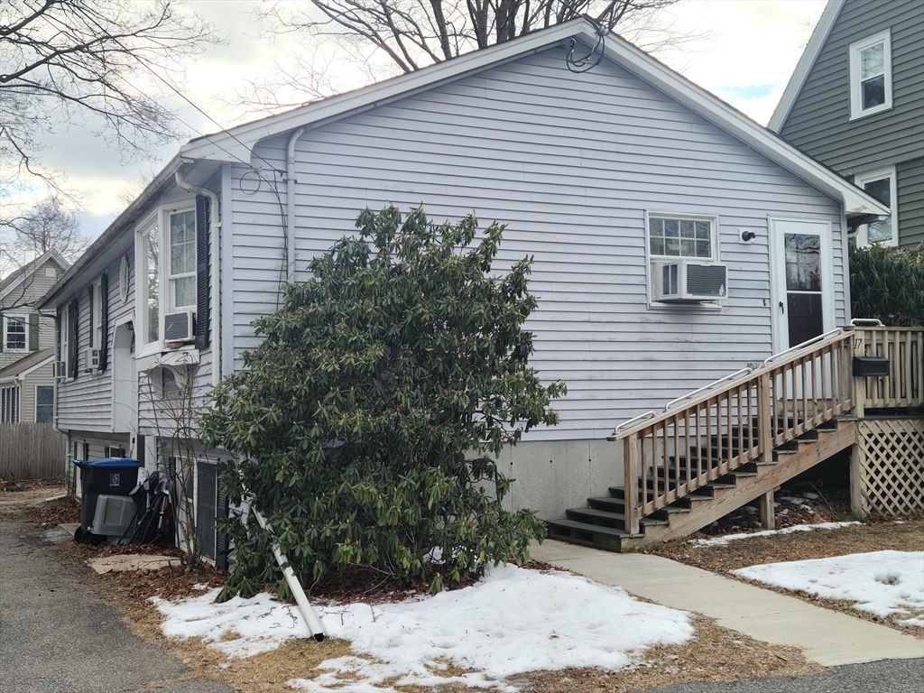 17 Harvard Street Natick, MA 01760 - Photo 3 of 12 a front view of a house with balcony