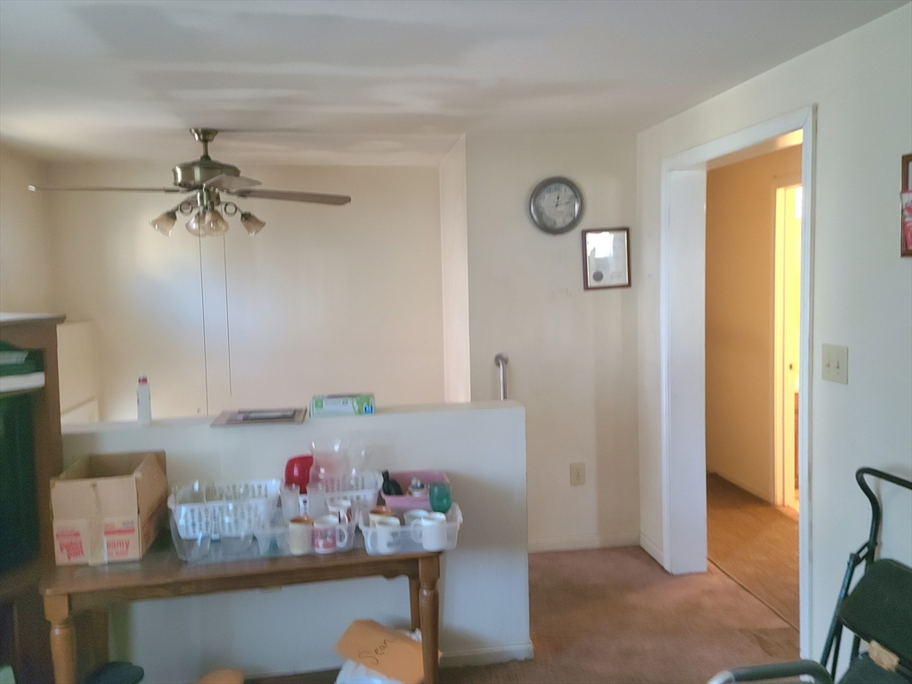 17 Harvard Street Natick, MA 01760 - Photo 9 of 12 a room with cabinet and window