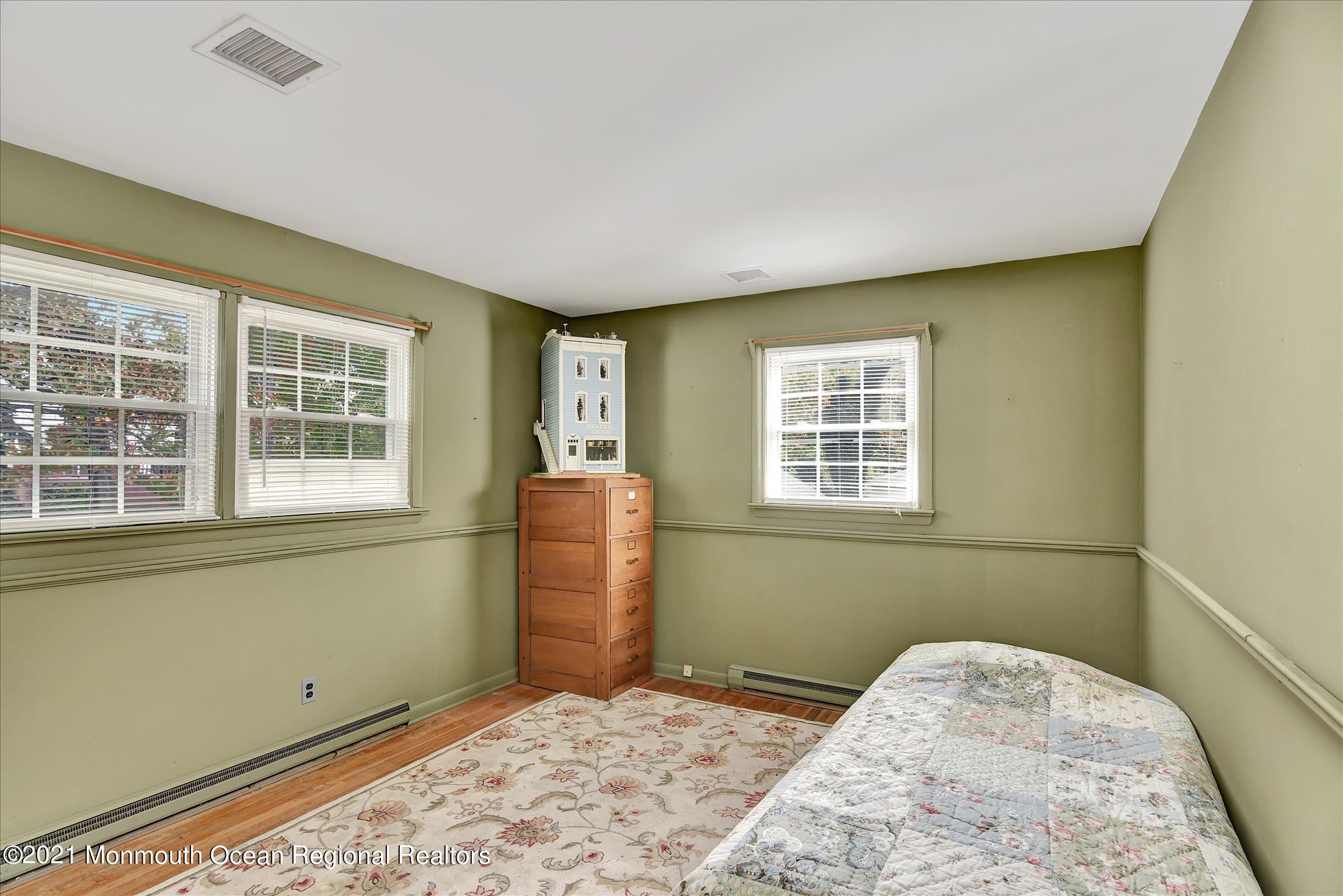 149 Crine Road Morganville, NJ 07751 - Photo 20 of 28 a view of a room with a large window