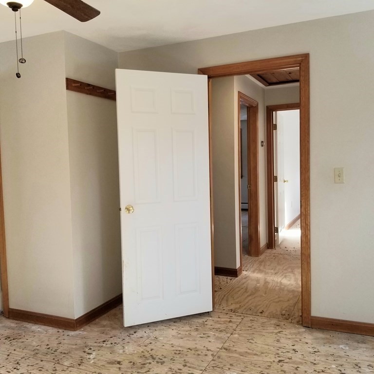 22 Whitney Road Shirley, MA 01464 - Photo 20 of 42 a view of a big room with wooden floor and closet