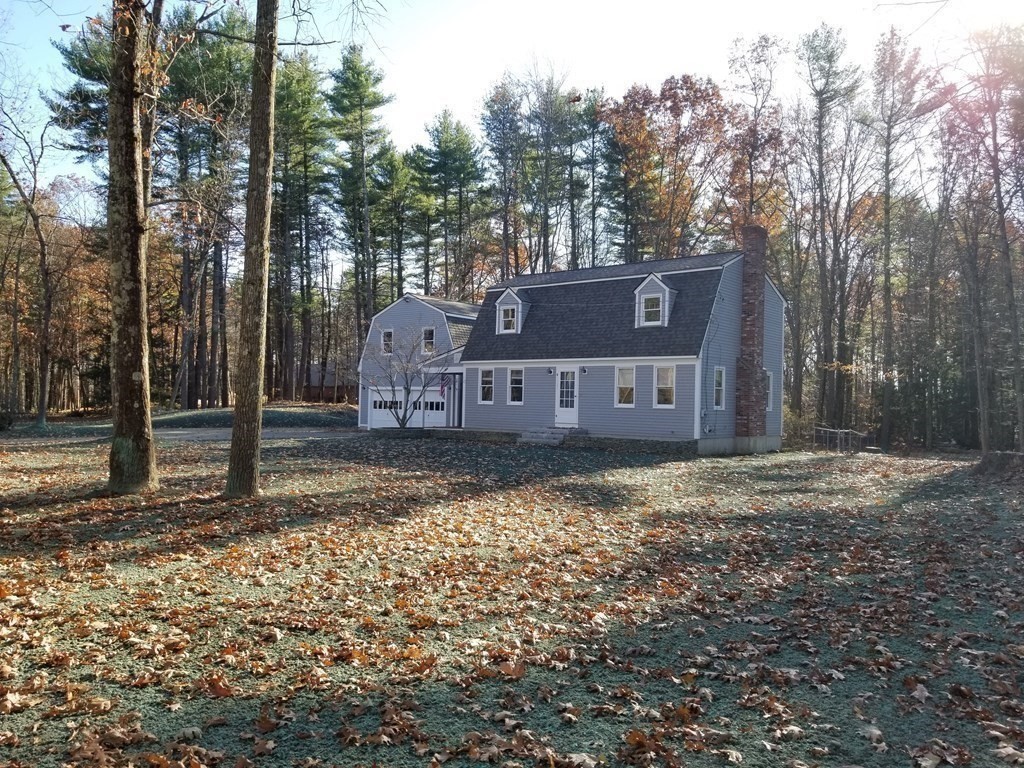 22 Whitney Road Shirley, MA 01464 - Photo 36 of 42 a view of a house with a yard next to a road