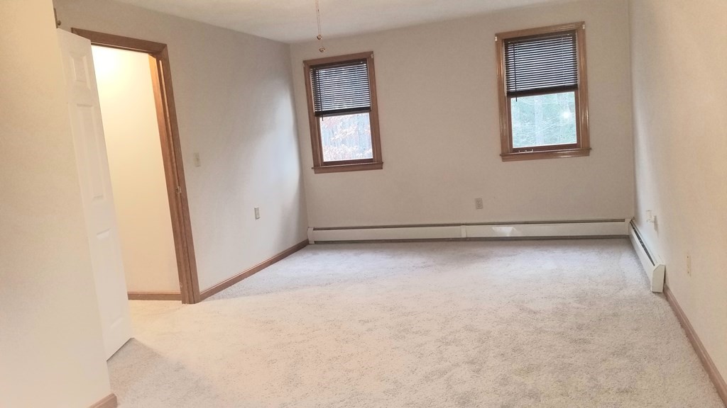 22 Whitney Road Shirley, MA 01464 - Photo 39 of 42 an empty room with windows and closet