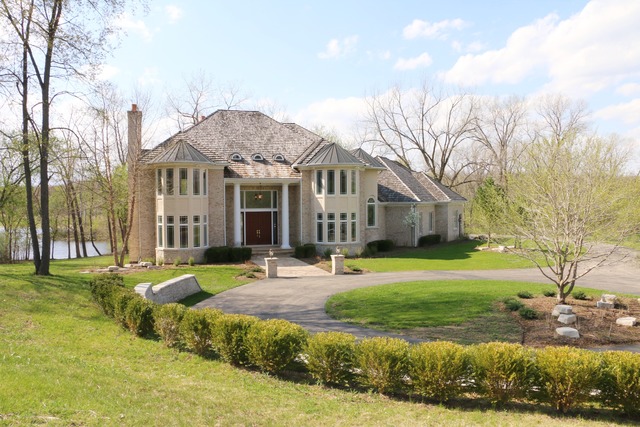 195 Bateman Road Barrington Hills, IL 60010 - Photo 1 of 23 a front view of a house with a yard