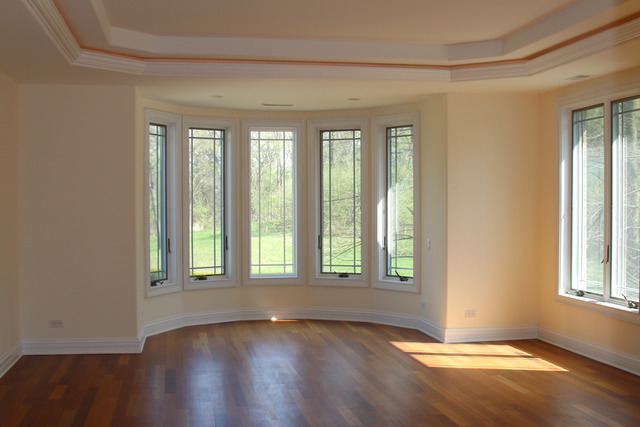 195 Bateman Road Barrington Hills, IL 60010 - Photo 14 of 23 an empty room with wooden floor and windows
