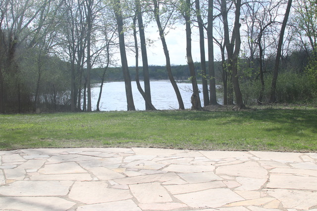 195 Bateman Road Barrington Hills, IL 60010 - Photo 18 of 23 a swimming pool with trees in the background