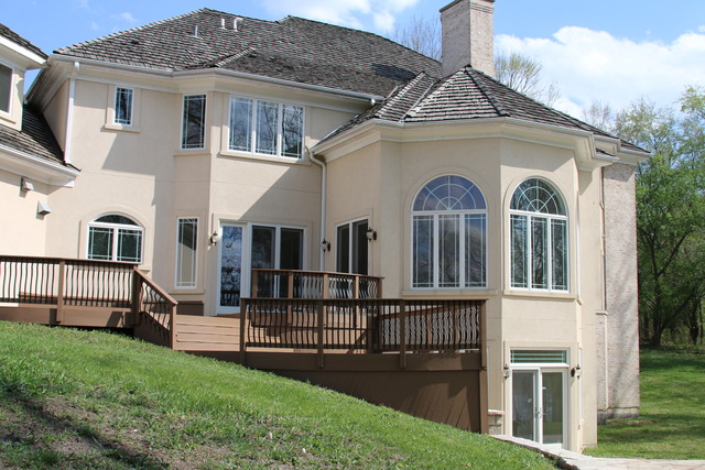 195 Bateman Road Barrington Hills, IL 60010 - Photo 21 of 23 a front view of a house with a yard