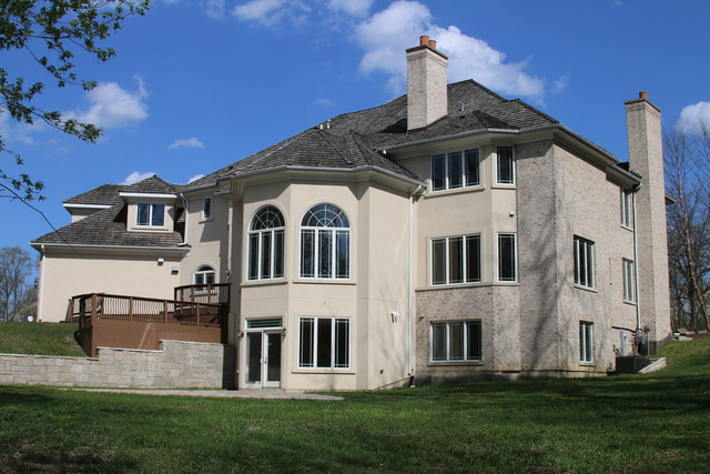 195 Bateman Road Barrington Hills, IL 60010 - Photo 22 of 23 a front view of a house with a yard