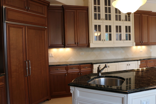 195 Bateman Road Barrington Hills, IL 60010 - Photo 6 of 23 a kitchen with granite countertop a sink and cabinets