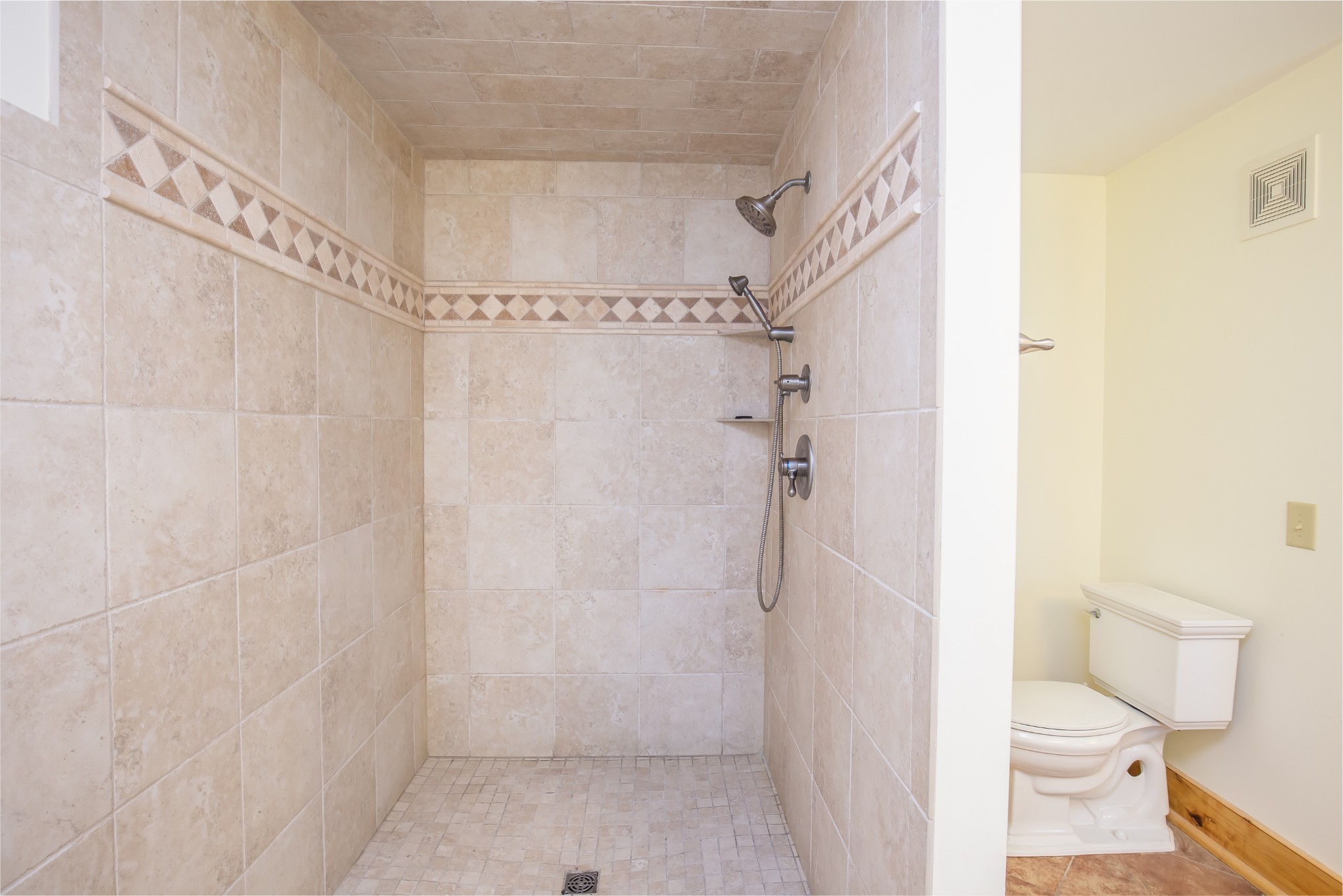 521 Coop Road Bell Buckle, TN 37020 - Photo 54 of 63 a bathroom with a shower a toilet and a shower