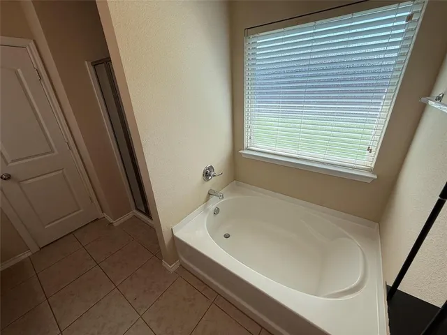 a bathroom with a bathtub