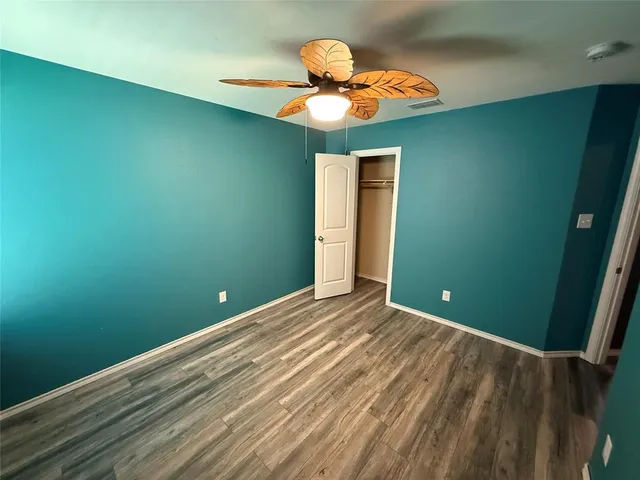 a view of a room with a fan