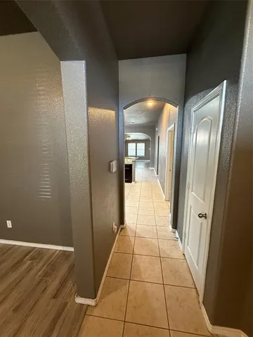 a bathroom with a glass door shower