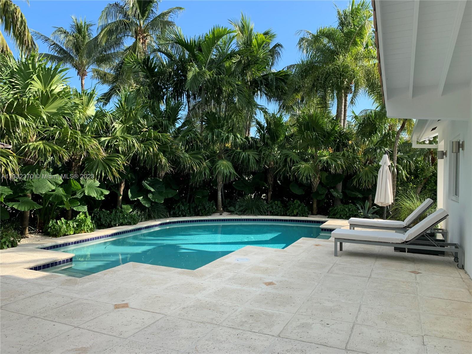 280 Hampton Lane Key Biscayne, FL 33149 - Photo 12 of 30 a view of a park with slide and bench