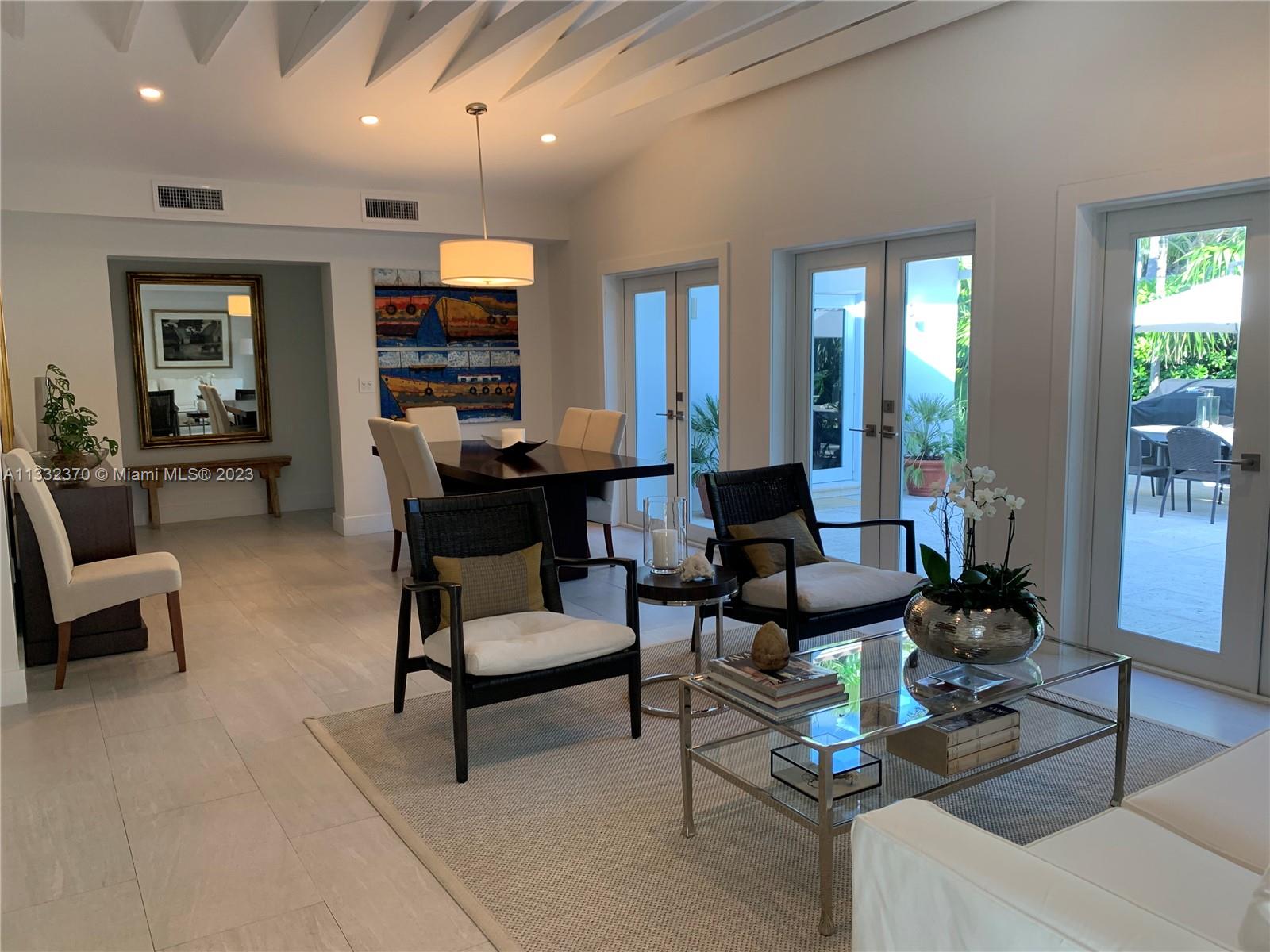 280 Hampton Lane Key Biscayne, FL 33149 - Photo 3 of 30 a living room with furniture and wooden floor