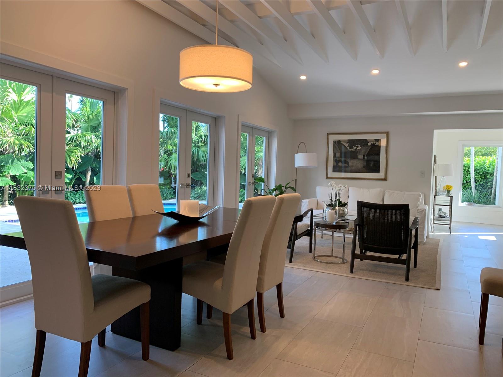 280 Hampton Lane Key Biscayne, FL 33149 - Photo 4 of 30 a view of a dining room with furniture window and outside view