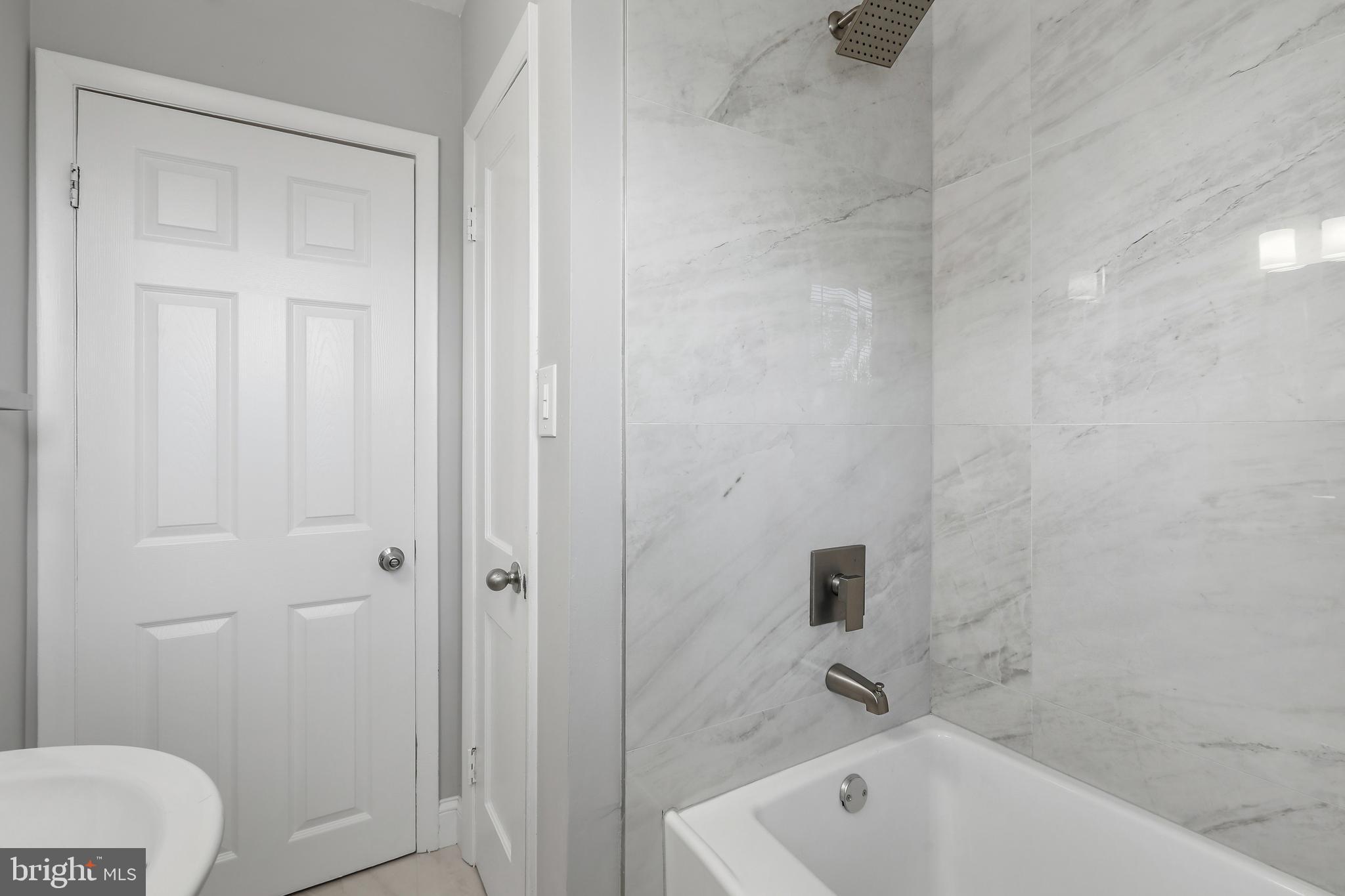 1714 Pin Oak Road Parkville, MD 21234 - Photo 27 of 41 Shower/tub combo with tile to ceiling