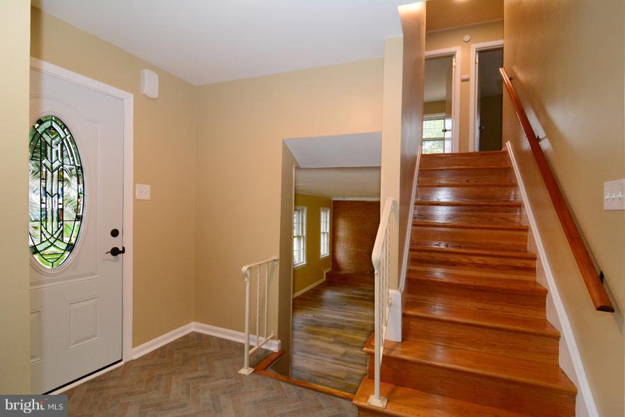 7610 Hayfield Road Alexandria, VA 22315 - Photo 4 of 28 View upstairs and downstairs from foyer