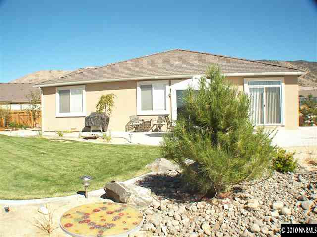 10799 Stone Hollow Drive Reno, NV 89521 - Photo 9 of 9 a view of a house with a backyard