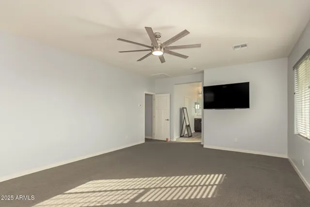 a view of a livingroom with a flat screen tv