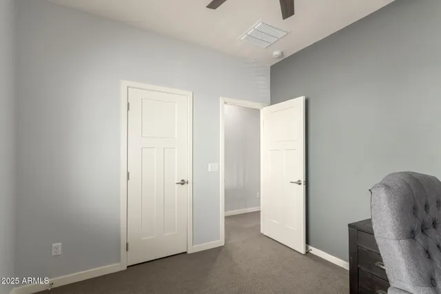 a view of room with furniture and wooden floor