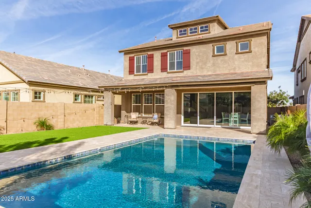 a front view of a house with a yard and porch