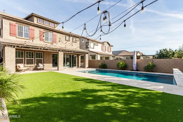 a view of a house with a swimming pool
